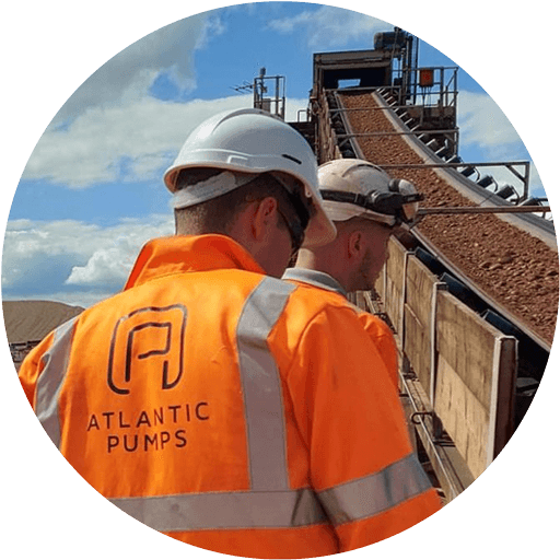 2-engineers-on-site-with conveyor-of-rocks