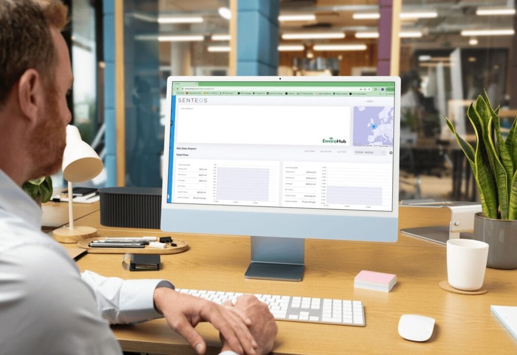 man looking at computer stats