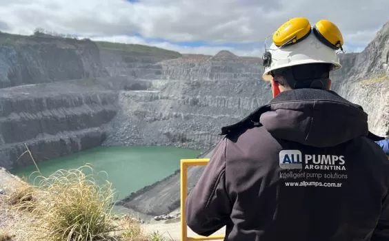 pump engineer overlooking quarry lagoon